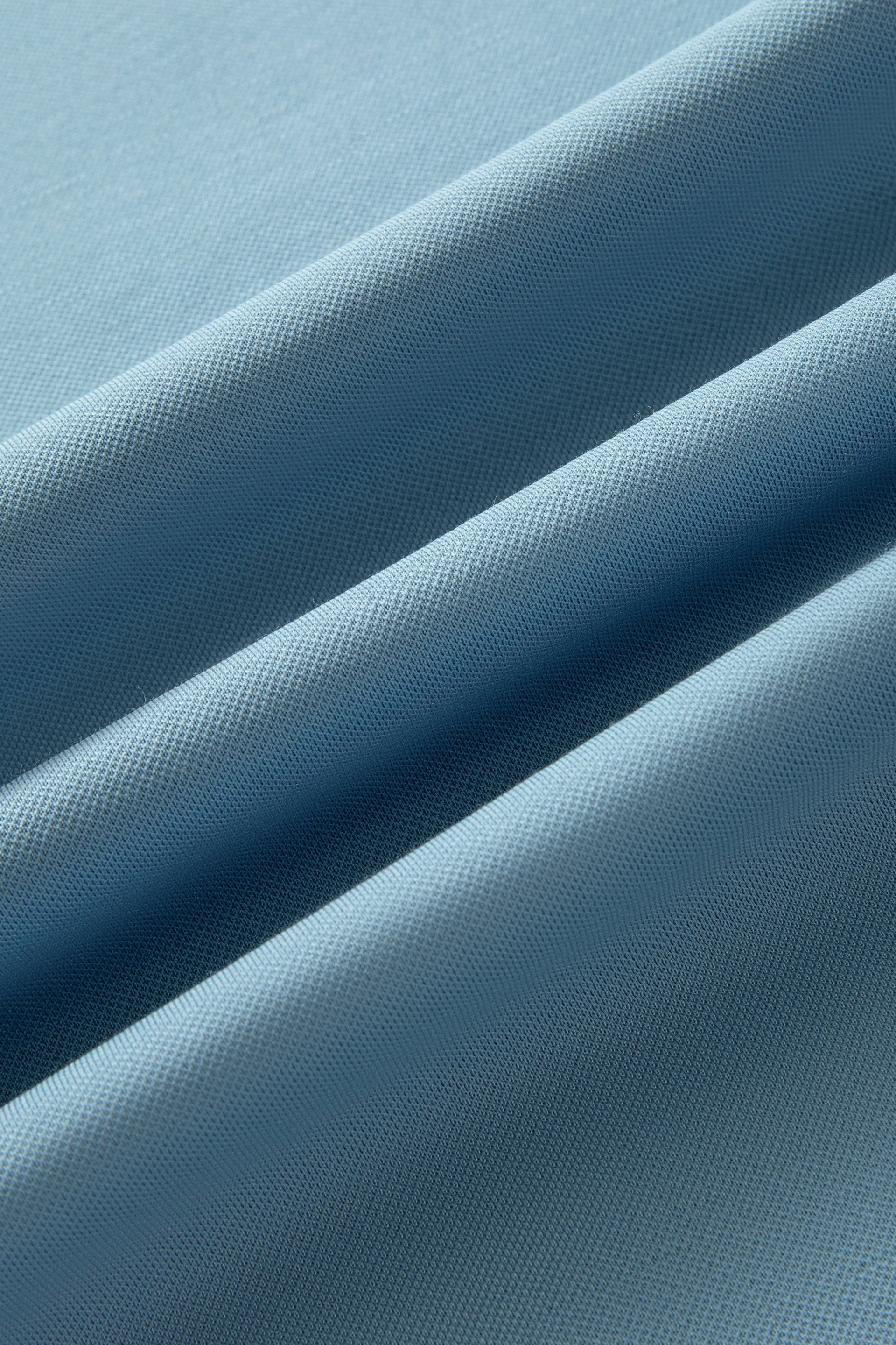 Polo piqué avec patte de boutonnage dissimulée | Bleu mystique BLE128