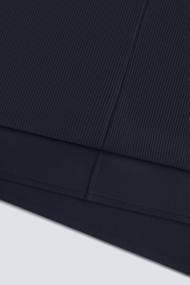 Polo sans boutonnage en maille gaufrée | Bleu marine NNY096